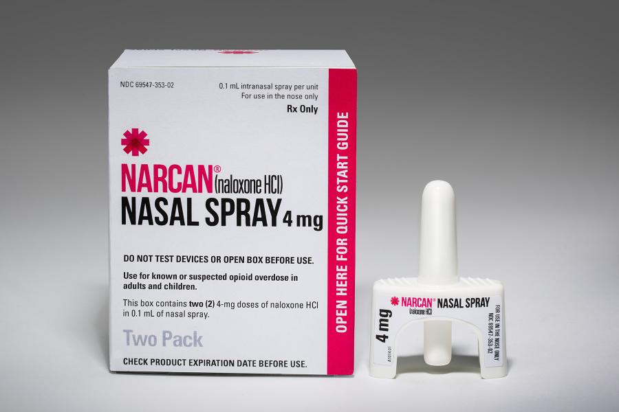 Extreme close of Narcan Nasal Spray box and plunger